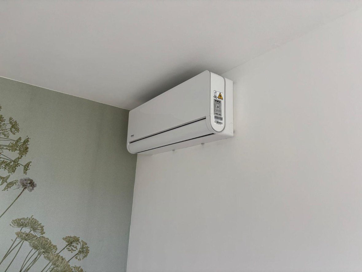 Witte Vivax wandunit in een slaapkamer